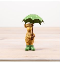 Bringing a bit of British countryside charm to your home with our Highland Cow figurine