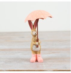 Bring a touch of whimsy to your décor with our Rabbit & Umbrella figurine