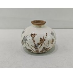 Add charm to your home with our elegant Floral Pattern Vase 