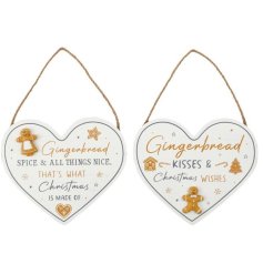 Spread some holiday joy with our charming gingerbread hanging plaque 
