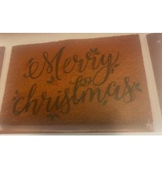 Spread festive cheer with our vibrant 60x40cm Merrychristmas Doormat 