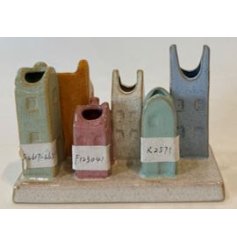Bring a touch of elegance and nature into your home with our charming House Bud Vases.