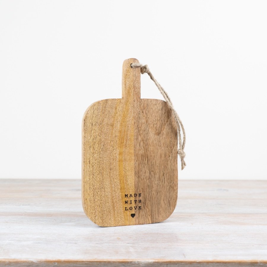 This wooden chopping board is beautifully engraved with the words "Made with Love."