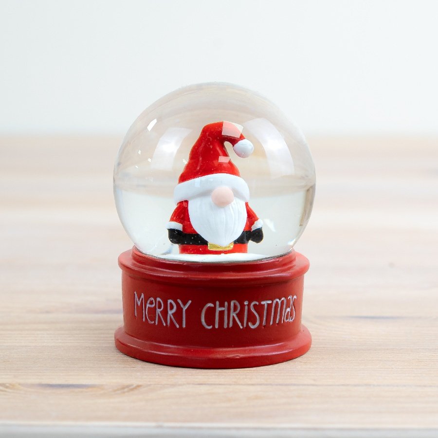 Celebrate Christmas with our festive snow globe featuring a jolly Santa in a winter wonderland.