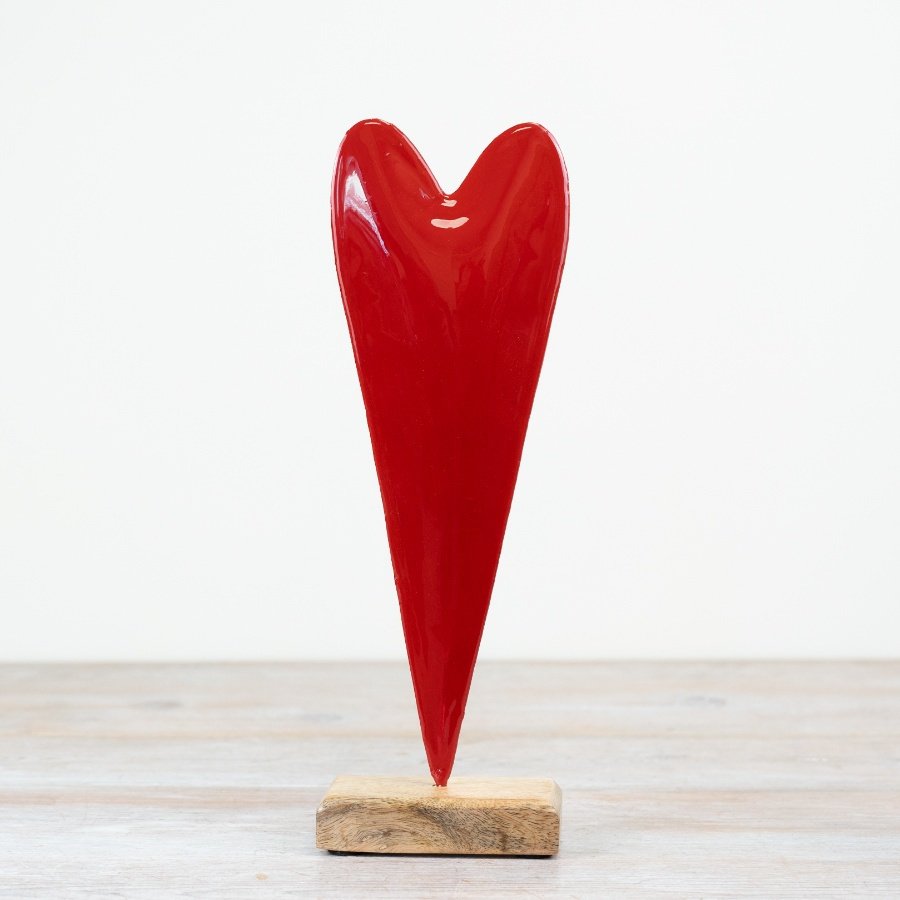 Add colour and texture to the home with this glossy red iron heart complete with mango wood base.