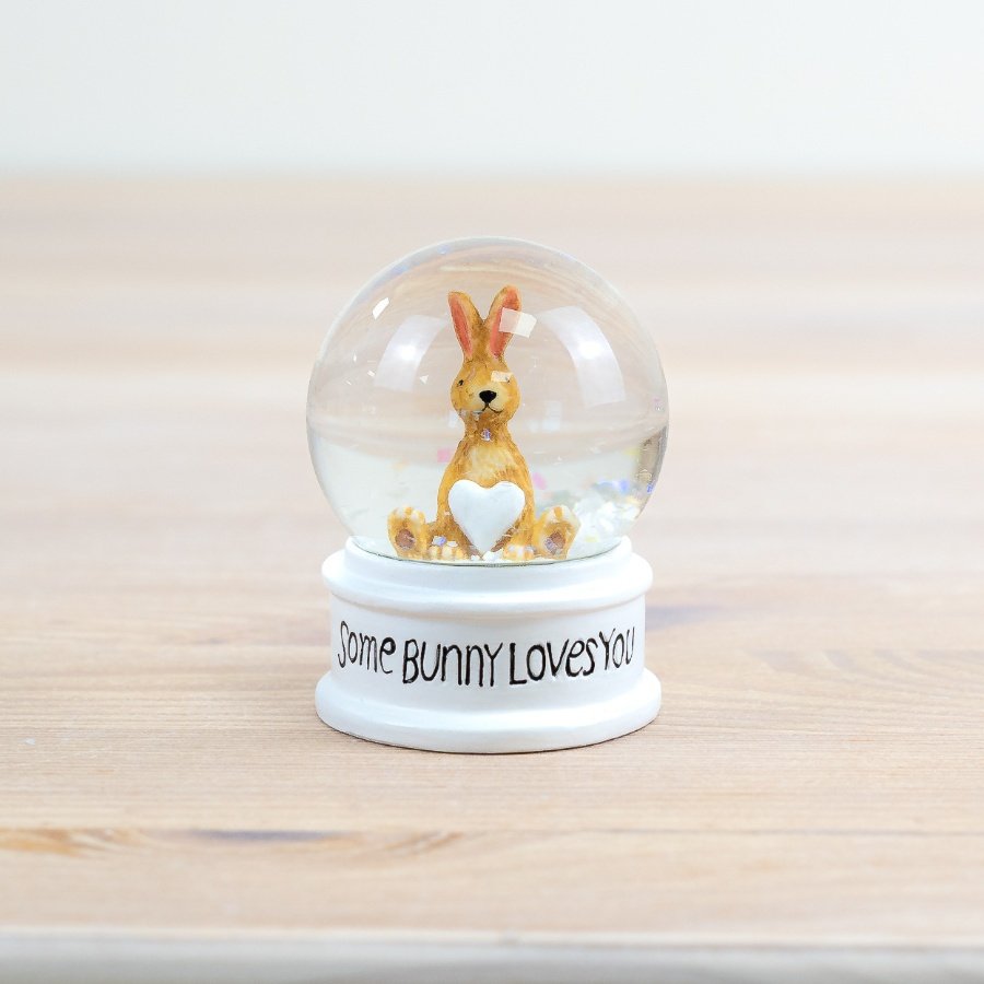 Add a whimsical touch to your Easter decor with our stunning snow globe featuring a charming Easter-themed design!