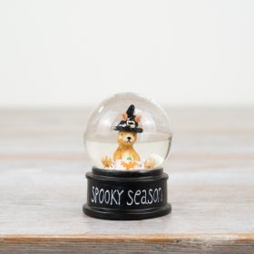 Whimsical pumpkin water globe featuring a cute rabbit witch - perfect for adding a touch of magic to your decor!