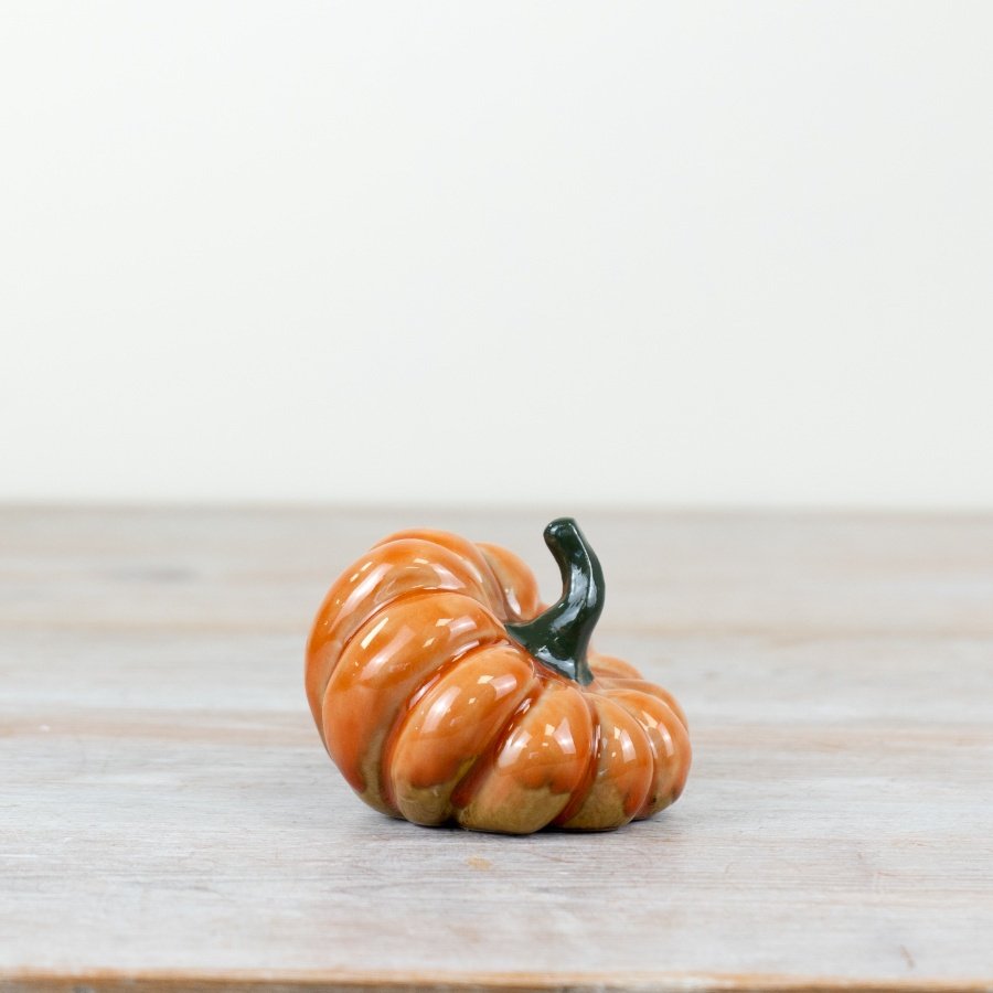 Stay cozy this fall with our trendy pumpkin decorations