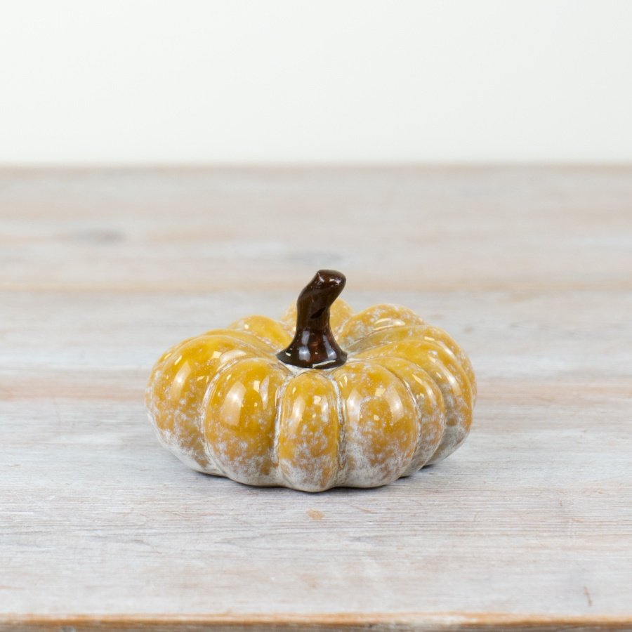 "Add a pop of autumnal charm with our beautifully crafted Pumpkin Ornament