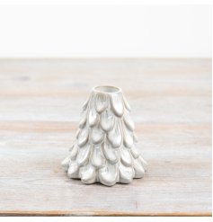 Add a touch of elegance to the Christmas table with this beautiful glazed candle holder in the shape of a festive Christ