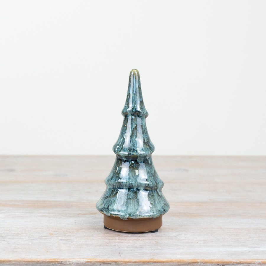 Deck your halls with our charming Green Tired Tree Ornament, a festive addition to your holiday decor.