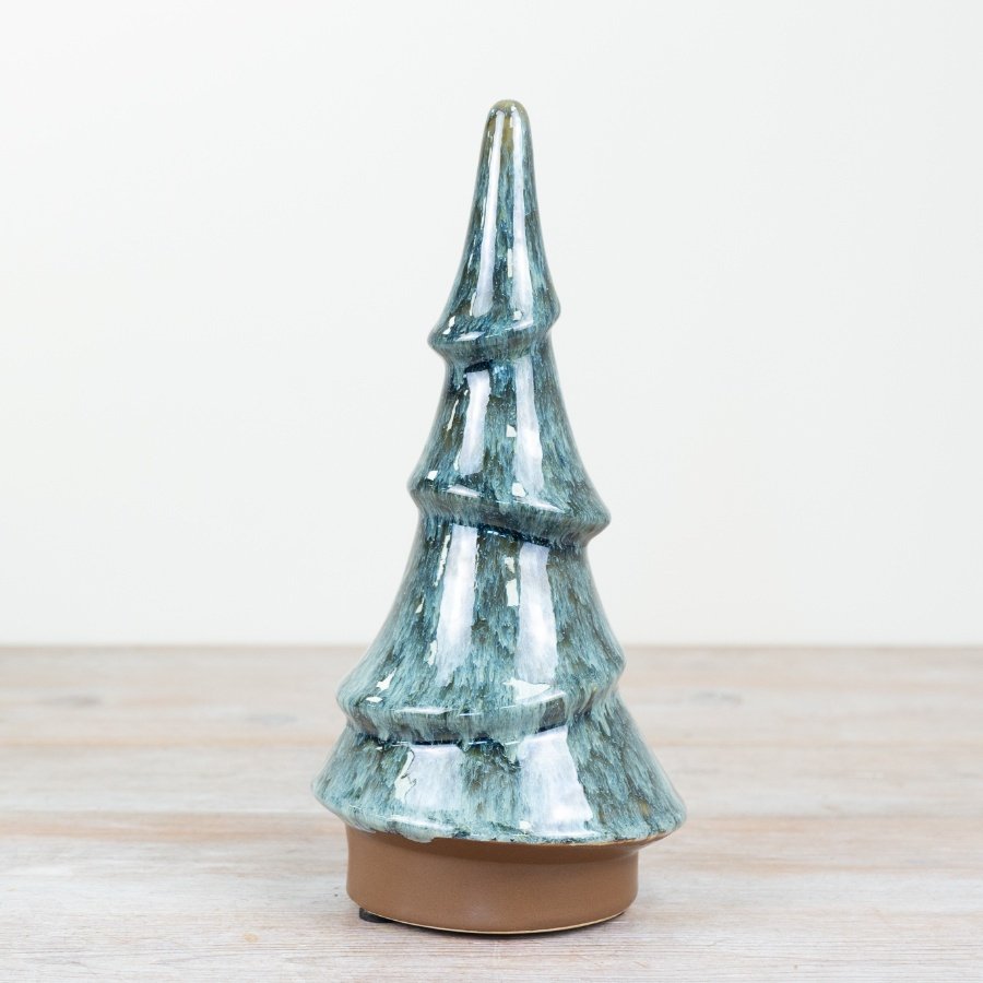 A unique and beautifully crafted Christmas Tree. Richly glazed with a stunning coloured finish. 