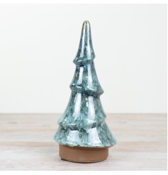 Make a statement with this stunning contemporary Christmas tree with a green glazed finish. 