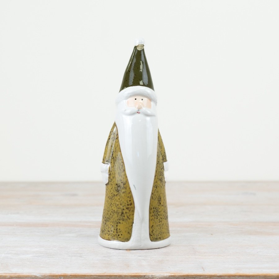 Add a touch of rustic charm to your festive collection with this delightful green Santa ornament