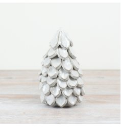 Add a touch of rustic charm to your holiday collection with this 19cm handmade ceramic Christmas tree.
