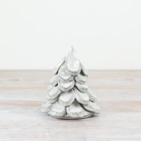A rustic Christmas tree with beautifully crafted leaves, layered upon each other.
