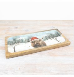 A beautiful highland cow tray. Made from mango wood with a colourful enamel design. 
