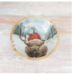 A unique mango wood bowl with a beautiful Christmas highland cow design. 