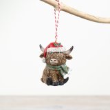 A delightful Highland Cow hanging ornament made from resin