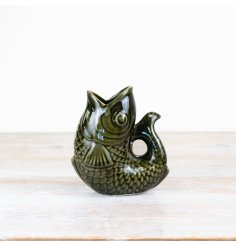Bring some aquatic charm to your home with our dark green fish jug. 