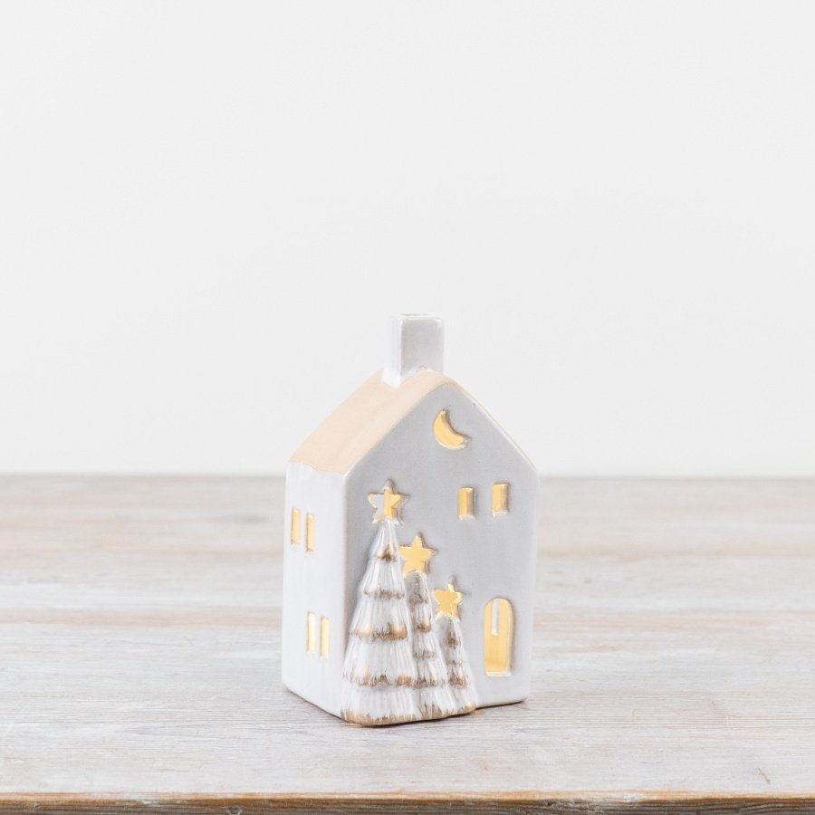 Introducing our stunning white ceramic LED house, adorned with charming 3D Christmas trees finished in a luxurious gold 