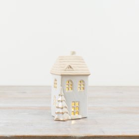  Add a warm and inviting touch to the home with this charming LED ceramic house
