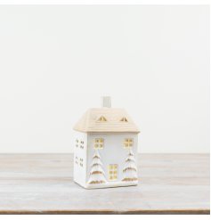 A stunning ceramic LED house with a raw finish roof and 3D gold detailed roof