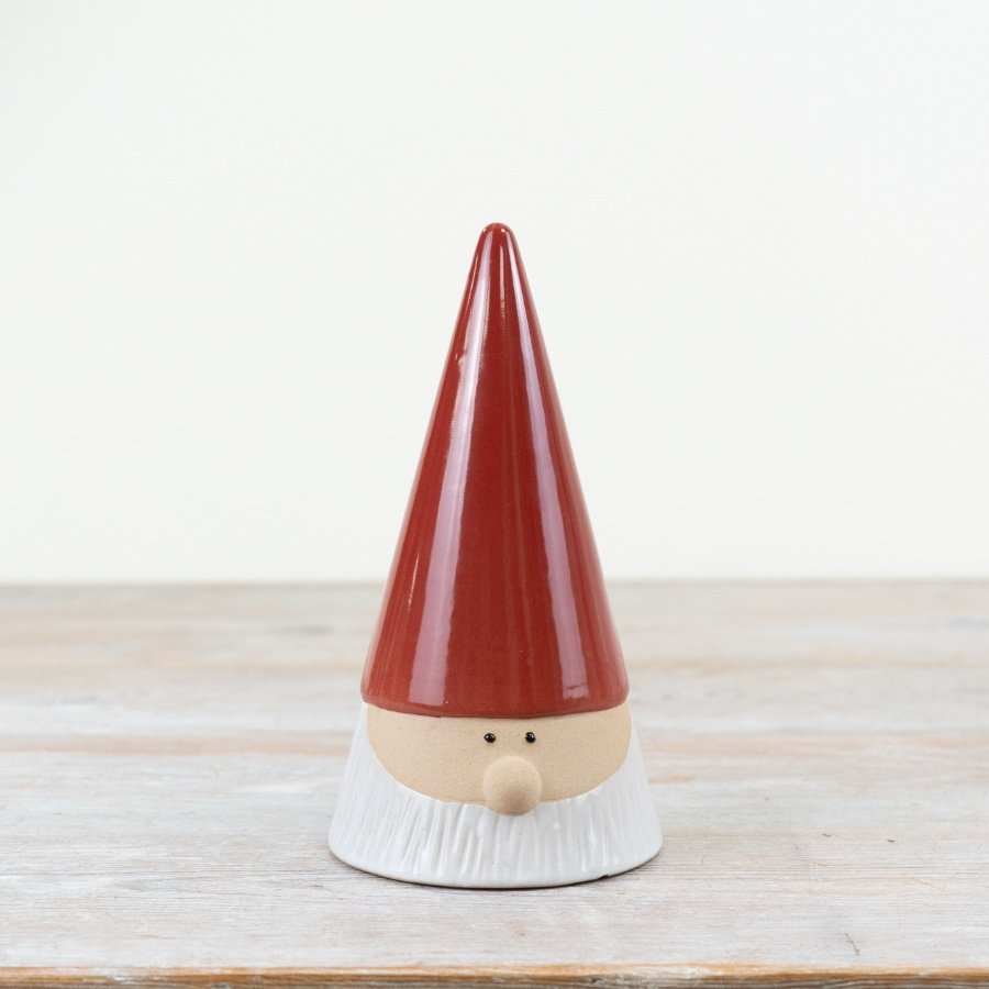 Introducing our charming ceramic gonk figurine, complete with a beautiful red hat. 