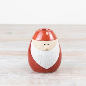 Introducing a charming gonk candle holder in a vibrant red hue