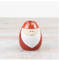 A delightful little gonk candle holder in red. Perfect for tapered candles