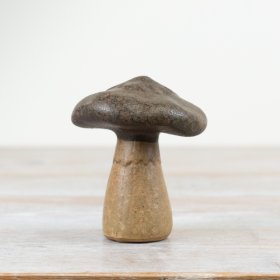 Add a touch of forest charm to your space with our Stoneware Mushroom Decoration. 