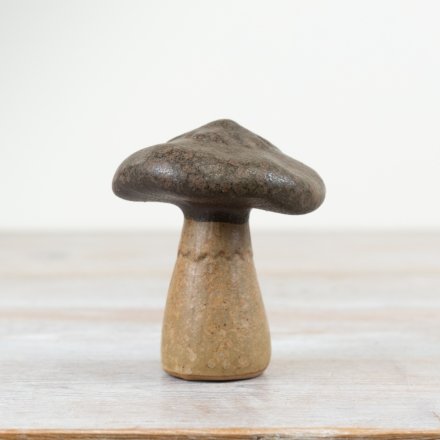 Bring the enchantment of the forest into your home with our Mushroom Decoration Stoneware.