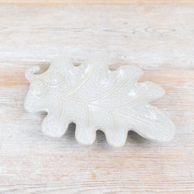 Add a touch of nature to your home decor with our Stoneware White Leaf Plate.