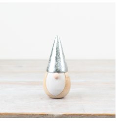 Introducing a charming wooden gonk, complete with a rustic silver hat