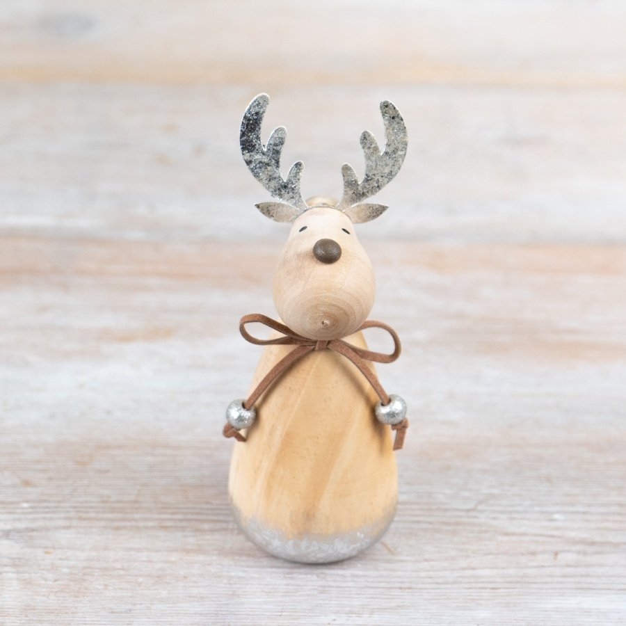 A charming wooden reindeer decoration with metal antlers and a rustic brown bow.