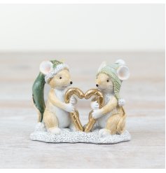 This charming ornament showcases a pair of mice holding a candy cane.