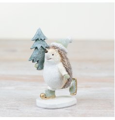 Introducing a charming ice skating hedgehog, adorned with a festive Christmas tree
