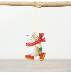 Add a touch of charm to your festive collection with this delightful skating hedgehog ornament. 