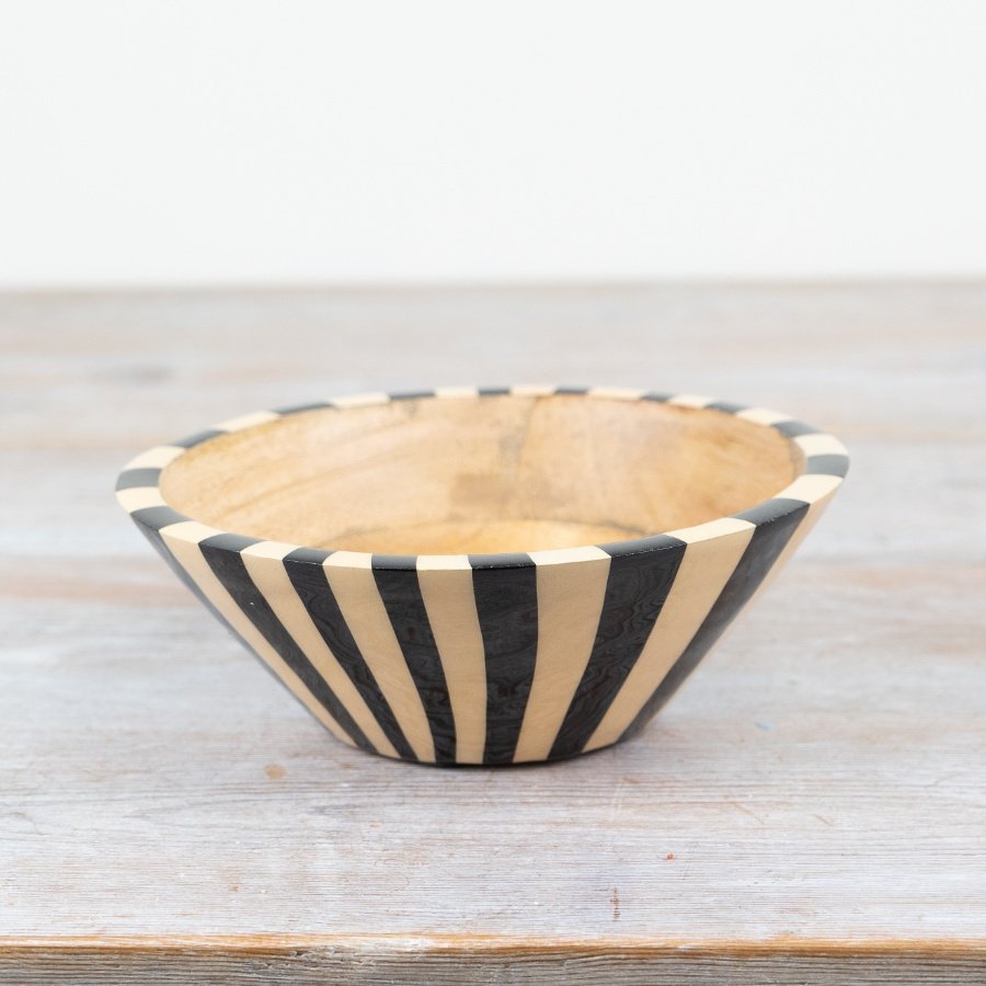 Serve in style with this elegant bowl, featuring a sleek stripped design.