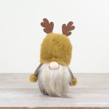A rustic woodland gonk with antlers. In a rich and earthy palette of ochre, brown and cream hues. 