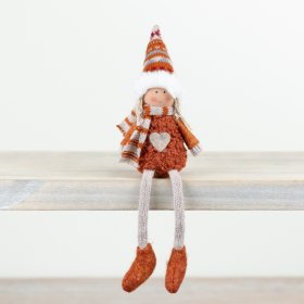 Our charming autumnal sitting doll, dressed in a delightful burnt orange ensemble with a scarf and hat