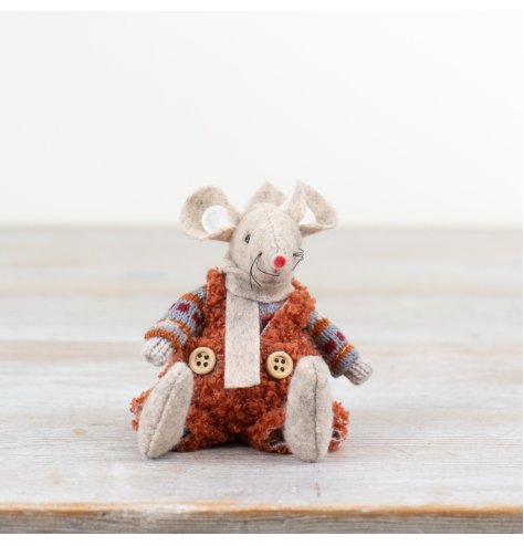 Adorable fabric mouse decor adds charming touch.