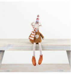 An adorable autumnal fabric mouse complete with a striped scarf and patterned hat