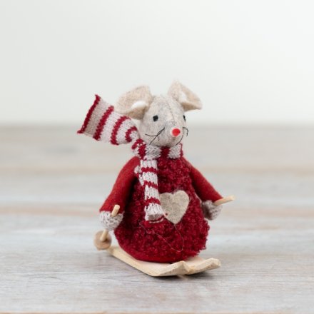 A charming felt mouse decoration with wooden skis and a chic knitted scarf.