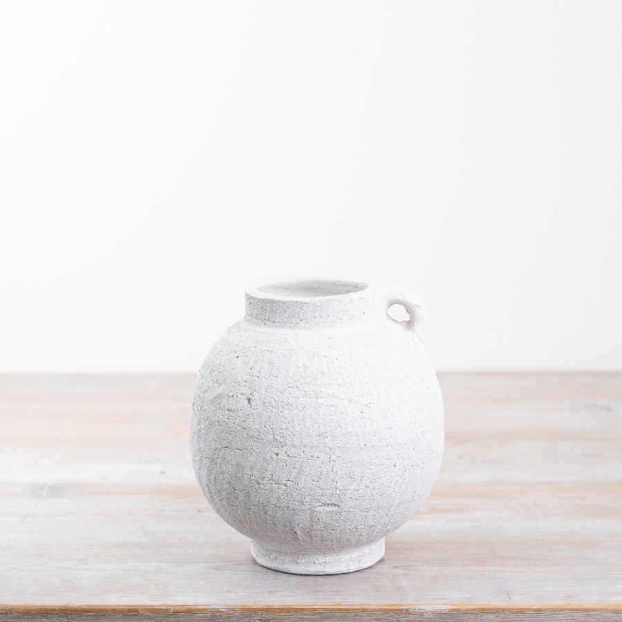 Upgrade your home decor with our exquisite white vase made of Terracotta. 