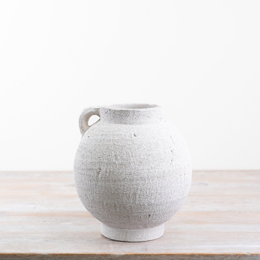 Elevate your home decor with our stunning White Rustic Terracotta Vase. 