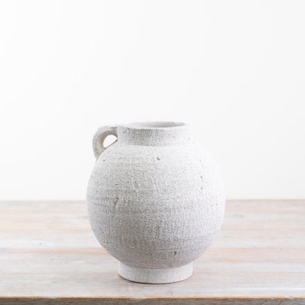 Enhance your home with our exquisite White Terracotta Vase, adding a charming touch of rustic elegance.