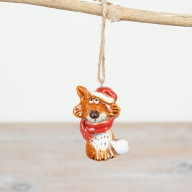 A unique, hand finished fox ornament with a rich amber reactive glaze. Complete with a rustic jute string hanger. 