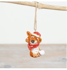 Add rustic charm to your seasonal displays with this unique, hand finished fox decoration.