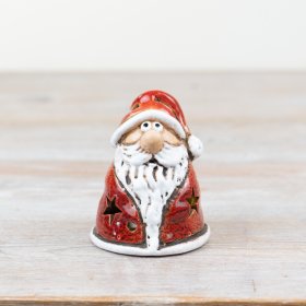Add character and charm to your seasonal collection with this hand finished Santa ornament.